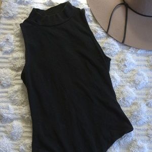 Black high neck one piece.